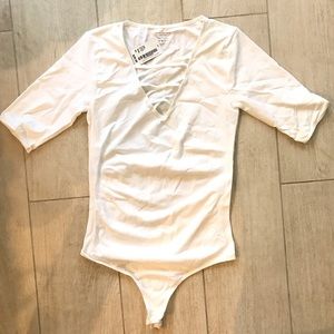 Woman’s White Bodysuit **NWT**